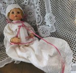 porcelain baby doll white gown a